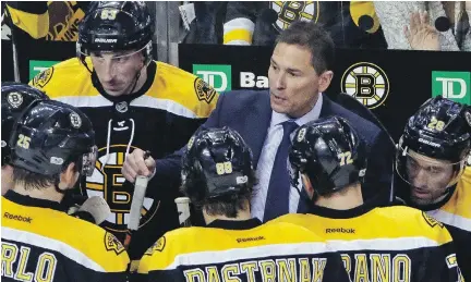  ?? ELISE AMENDOLA/THE ASSOCIATED PRESS ?? Interim coach Bruce Cassidy has had an immediate impact on the Boston Bruins, with three wins in as many games since taking over from Claude Julien. That last win, a 4-0 victory Sunday, came against the Montreal Canadiens, who have lost 10 of their last 14.