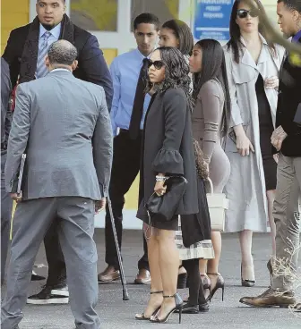  ?? STAFF PHOTOS BY CHRISTOPHE­R EVANS ?? HIGH PROFILE: Aaron Hernandez’s longtime fiancee, Shayanna Jenkins Hernandez, center above, attended Hernandez’s funeral yesterday at O’Brien Funeral Home in Bristol, Conn. His mother, Terri Hernandez, left, stepped outside for a moment.