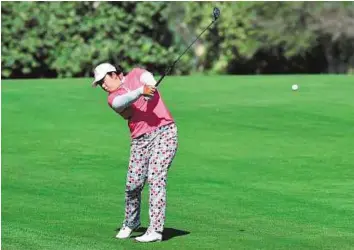  ?? Atiq-ur-Rehman/Gulf News ?? Cruise mode Shanshan Feng in action during the Omega Dubai Ladies Master at Emirates Golf Club. The Chinese player is in good position to defend her title.