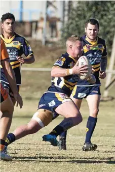  ??  ?? Highfields lock Sam Bielefeld uses his footwork against Southern Suburbs.