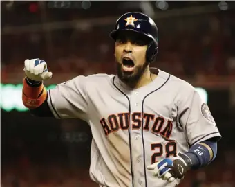  ?? GETTY IMAGES ?? MAKING IT A SERIES: Robinson Chirinos hit a sixth inning home run Friday night helping the Astros win Game 3, 4-1, cutting Washington’s series lead to 2-1.