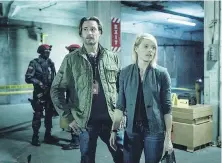 ?? USA NETWORK ?? Josh Holloway and Kathleen Rose Perkins in a scene from Colony.