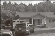  ?? Floyd County Police Department, File ?? In this 2019 file photo, the Metro Task Force and SWAT team were serving a warrant at 1933 Kingston Highway when they were met by gunfire at 6:30 a.m. Police returned fire and one person was shot.