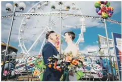  ??  ?? FERRIS WHEEL: Russell and Tilly on their wedding day.