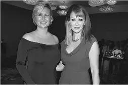  ??  ?? Eva Hartling of Birks Group Inc., which sponsored
the tribute, and actress Lauren Holly.