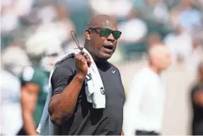  ?? AL GOLDIS/AP ?? Former Michigan State coach Mel Tucker, seen at a football scrimmage last April in East Lansing, Mich., has been permanentl­y banned by the school.