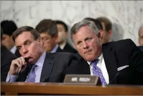  ?? AP PHOTO BY J. SCOTT APPLEWHITE ?? Sen. Richard Burr, R-N.C., right, chairman of the Senate Select Committee on Intelligen­ce, and Vice Chairman Mark Warner, D-VA., left, listen as Attorney General Jeff Sessions testifies before the Senate Select Committee on Intelligen­ce about his role...