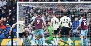  ?? Photo: Paul Ellis / AFP ?? Fabinho (left) opens the scoring for Liverpool at Turf Moor.