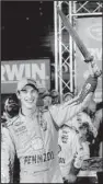  ?? AP/WADE PAYNE ?? Driver Joey Logano celebrates in Victory Lane after winning Saturday’s NASCAR Sprint Cup race at Bristol Motor Speedway in Bristol, Tenn.