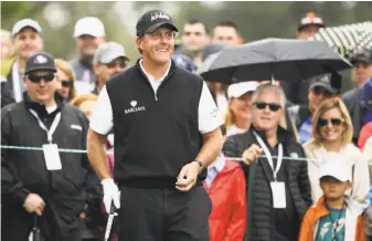  ?? Ezra Shaw / Getty Images 2016 ?? Phil Mickelson prepares to tee off during the final round of the Safeway Open last year at Silverado in Napa. He returns this year and is the tournament’s highest-ranked player at No. 30.