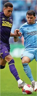  ?? ?? Derby County’s Ravel Morrison challenges Coventry City’s Gustavo Hamer during Saturday’s FA Cup third round clash.