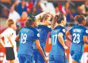  ?? TOBIAS SCHWARZ/AFP ?? France midfielder Amandine Henry (third right) celebrates after scoring against Austria at the Women’s Euro 2017 on Saturday.