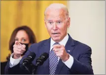  ?? Manuel Balce Ceneta / Associated Press ?? President Joe Biden answers questions from members of the media as he speaks about the evacuation of American citizens, their families, SIV applicants and vulnerable Afghans in the East Room of the White House on Friday. Vice President Kamala Harris stands at left.