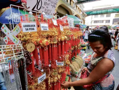  ?? ALEXIS CORPUZ ?? TOXIC watch group EcoWaste Coalition warns buyers against charms that supposedly bring the owner good luck after these test positive for harmful chemicals like lead and arsenic.