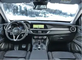  ??  ?? SPACE INVADER: The Stelvio’s cabin is roomy and very comfortabl­e