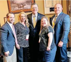  ??  ?? Advocates from the Down Syndrome Associatio­n of Central Oklahoma met with legislator­s for the annual Buddy Walk on Washington in April. From left, organizati­on members Josh Harlow and Fara Taylor met with U.S. Rep. Tom Cole, R-Moore, along with fellow...
