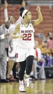  ?? ERIC GAY / ASSOCIATED PRESS ?? North Carolina State guard Dominique Wilson made her first NCAA Tournament game memorable, finishing with 23 points and five rebounds.