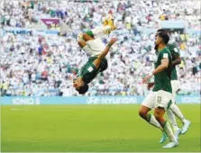  ?? ?? Saudi Arabia’s midfielder Salem al-Dawsari celebrates scoring his team’s second goal during the Qatar 2022 World Cup Group C match against Argentina at the Lusail Stadium yesterday.