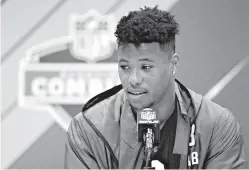  ?? AP Photo/Darron Cummings ?? ■ Penn State running back Saquon Barkley speaks during a press conference Thursday at the NFL football scouting combine in Indianapol­is.