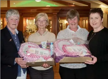  ??  ?? Courtown lady Captain Laura Funge, winners Ingrid Ashmore-Butler and Mary Cooper, with sponsor Marie Noctor of Lloyd’s Pharmacy, Gorey.