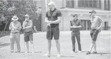  ?? Marie D. De Jesús / Houston Chronicle ?? J.J. Watt, center, is a towering presence compared with his playing partners in Monday’s charity event.