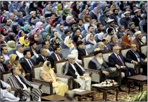  ?? AP/RAHMAT GUL ?? Afghan President Ashraf Ghani (front center) on Monday attends the first day of a loya jirga, a consultati­ve council that’s meeting in Kabul. More than 3,200 Afghans convened with the goal of agreeing on an approach to peace talks with the Taliban. “Reaching a sustainabl­e peace is very important to us,” Ghani told the delegates.