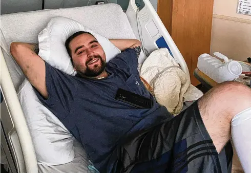  ?? COURTESY ajc.com ?? Blake Bargatze has impressed the medical staff with his can-do attitude as he continues to work on his recovery. He looks forward to reclaiming his life after nearly dying from COVID-19 and hopes to resume working remotely in coming weeks.