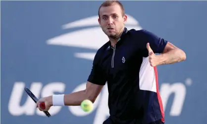  ?? Photograph: Matthew Stockman/Getty Images ?? Dan Evans fell to defeat when his second-round match resumed.