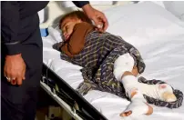  ?? AFP ?? An injured child at a local hospital in Sehwan. —