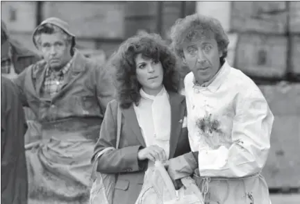  ?? BILL POLO — THE ASSOCIATED PRESS FILE ?? Gilda Radner and Gene Wilder perform in a scene from the film “Hanky Panky,” directed by Sidney Poitier in Boston.