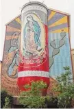  ?? File photo ?? Treviño’s “La Veladora” is a three-dimensiona­l mural depicting a votive candle bearing the image of the Virgin of Guadalupe.