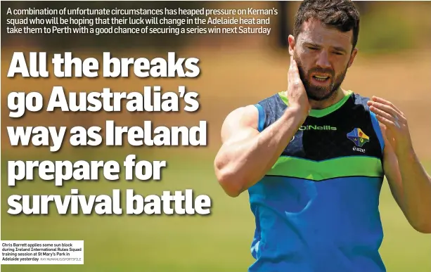  ?? RAY McMANUS/SPORTSFILE ?? Chris Barrett applies some sun block during Ireland Internatio­nal Rules Squad training session at St Mary’s Park in Adelaide yesterday