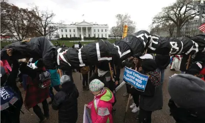  ?? Photograph: Kevin Lamarque/Reuters ?? Indigenous leaders protest against the Dakota Access and Keystone XL pipelines in front of the White House in March 2017.