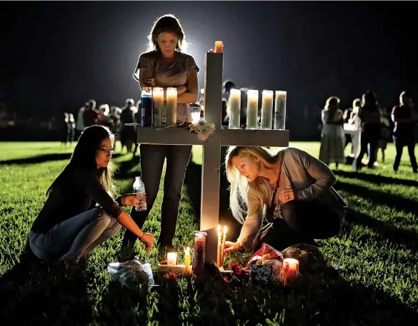  ??  ?? YOUNG WARRIORS Seeing that activism can have an effect, Gen Zs have become politicall­y engaged. Top to bottom: A candleligh­t memorial service for the shooting victims at Marjory Stoneman Douglas High School; U.S. Representa­tive Ilhan Omar; and the Tiktok app.