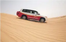  ?? Jaime Puebla / The National ?? Tourists on a dune bashing tour at the Dubai Desert Conservati­on Reserve