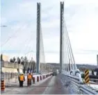  ?? JEFF LABINE/CHRONICLE-JOURNAL ?? Nipigon River Bridge was weighted down in January with concrete barriers after the bridge was raised several feet from the Trans-Canada Highway.