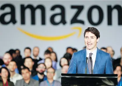  ?? JEFF VINNICK/GETTY IMAGES ?? Prime Minister Justin Trudeau flew in on April 30 to tout 3,000 new jobs as Amazon expands its operations in Vancouver. But it’s what he didn’t say that made his announceme­nt so opaque, columnist Douglas Todd writes.