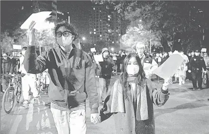  ?? ?? ▲ Movilizaci­ón contra las restriccio­nes por la pandemia en Pekín. Foto Afp