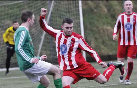  ??  ?? Goalscorer Adam McGoldrick, Ballisodar­e United in action against Colmanstow­n as teammate Keith Gilmartin watches on. Pic: Carl Brennan.