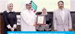  ??  ?? KUWAIT: Hind Al-Sabeeh honoring Waleed Al-Khashti for Zain’s support.