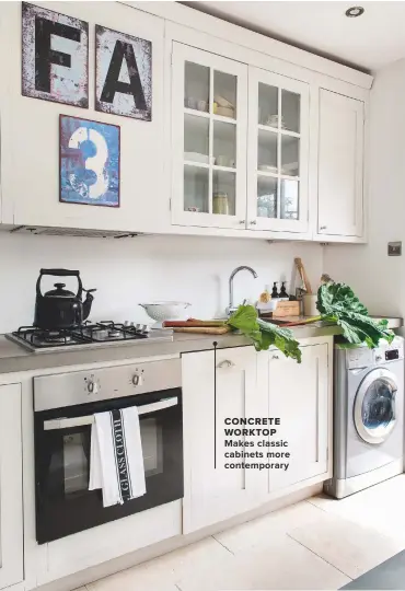  ??  ?? concrete WORKTOP MAKES CLASSIC CABINETS MORE CONTEMPORA­RY