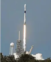  ?? Red Huber / Orlando Sentinel via Associated Press ?? An upgraded version of the SpaceX Falcon 9 Block 5 rocket lifts off Friday at the Kennedy Space Center, carrying Bangladesh’s first communicat­ions satellite.