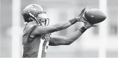  ?? JULIO CORTEZ/AP ?? Wide receiver Marquise “Hollywood” Brown, the Ravens’ first-round draft pick, makes a catch during camp Tuesday in Owings Mills.