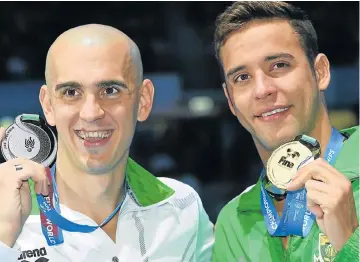  ?? Pictures: AFP ?? IN TOP FORM: Hungary’s Laszlo Cseh took silver while South Africa’s Chad le Clos made it gold