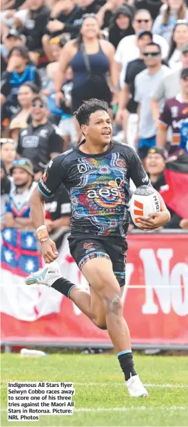  ?? ?? Indigenous All Stars flyer Selwyn Cobbo races away to score one of his three tries against the Maori All Stars in Rotorua. Picture: NRL Photos