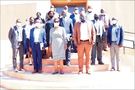  ??  ?? Seeking solutions… Prime Minister Saara Kuugongelw­a-Amadhila, governor of Kunene Marius Sheya (right), Outjo councillor Johannes Antsino (left) and other staff after the consultati­ve meeting.