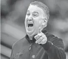  ?? GRACE HOLLARS/INDYSTAR ?? Purdue coach Matt Painter yells to the ref during the Midwest Region final.