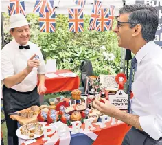  ?? ?? The Prime Minister samples a pork pie as producers raised their concerns