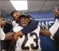  ?? DAVID J. PHILLIP / AP ?? Then-Rams defensive back Nickell Robey-Coleman (23) is not practicing social distancing as he celebrates in the locker room after a playoff win in 2019.