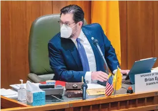  ?? EDDIE MOORE/JOURNAL ?? House Speaker Brian Egolf, D-Santa Fe, oversees a limited floor session Thursday. Temporary rules allowing for remote legislativ­e participat­ion have been targeted by a lawsuit filed by three House Republican­s.